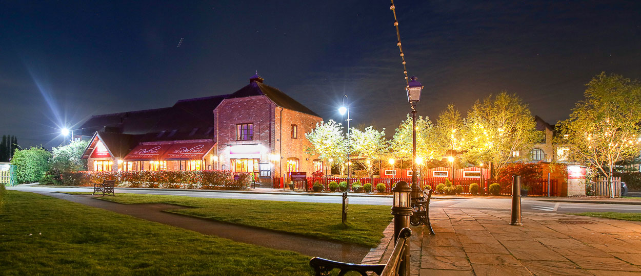 Photo of Red Carpet Cinema from outside at night